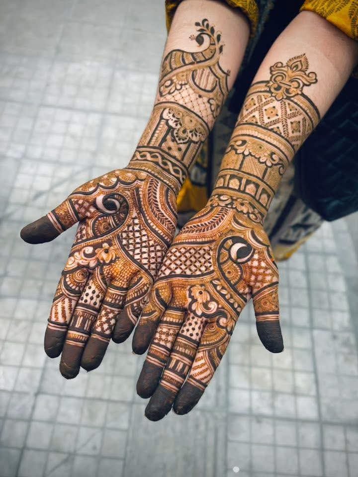 Bridal henna design on hands